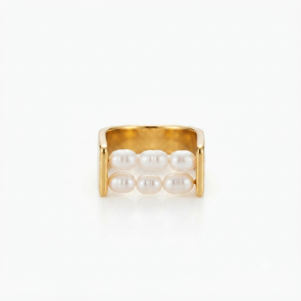 Anillo dos tiras de perlas